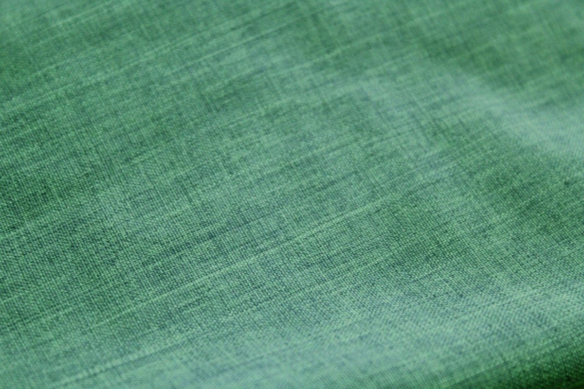 Ткань зеленого цвета текстура